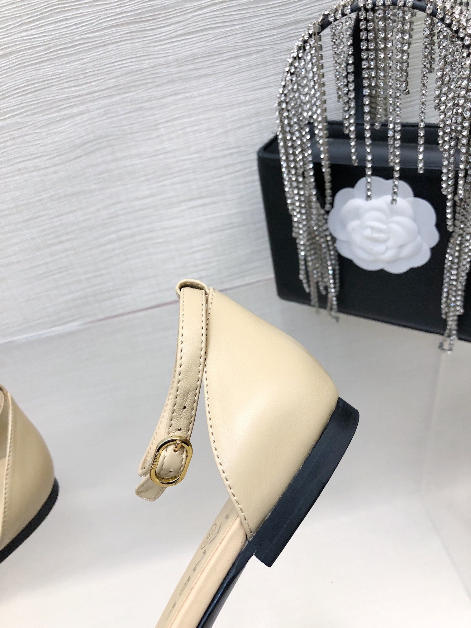 CHANEL BEIGE MIX BLACK LAMBSKIN CAMELLIA HOLLOW SANDAL